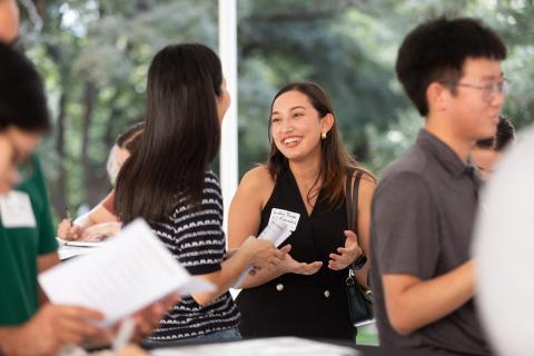 students talk outside