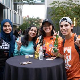 students outside at table