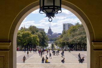 Students and Capitol through Main Building arch