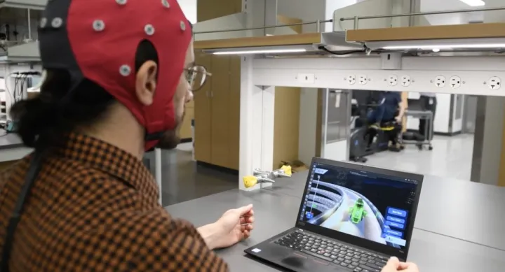 Student wearing electrode cap