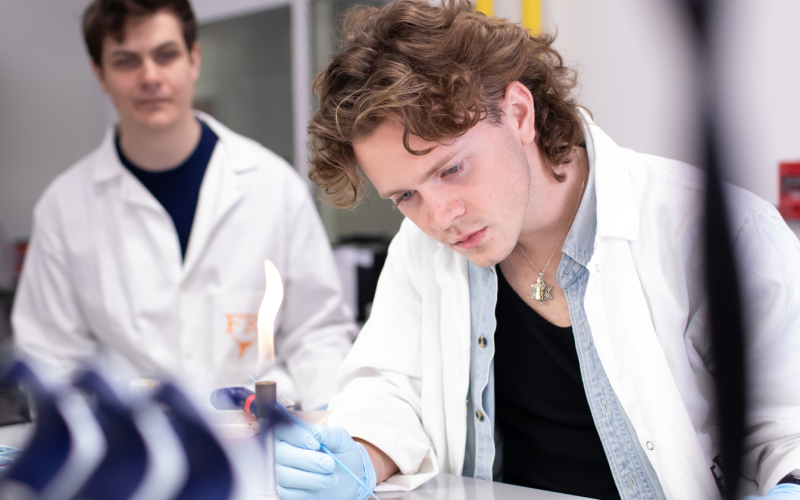 two researchers in a lab working