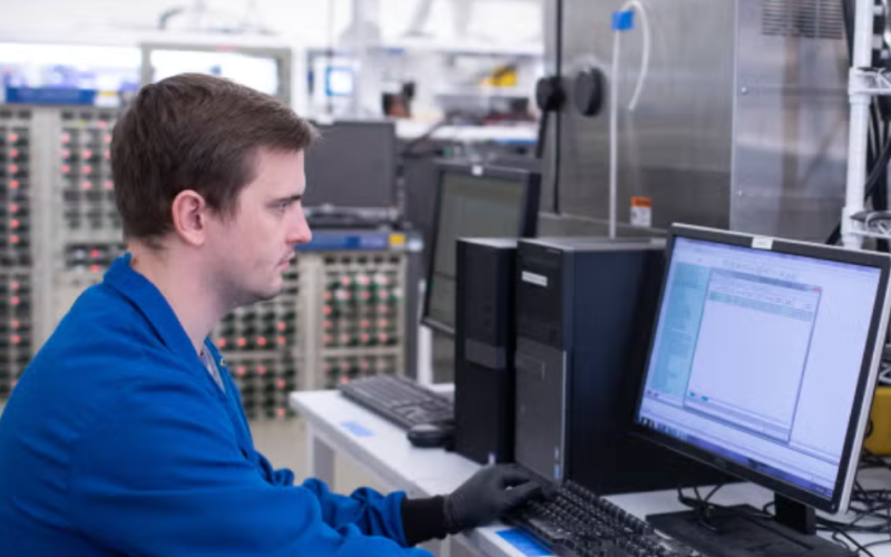 engineering student in lab on omputer